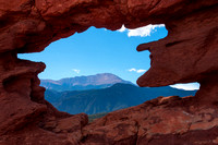 Pikes Peak Seen Through the Siamese Twins Rock Formation in Garden of the Gods